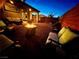 Inviting backyard featuring a cozy fire pit and comfortable seating, ideal for outdoor entertaining at 4132 Ancient Well Ct, Las Vegas, NV 89135