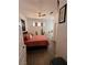 Bedroom with a queen-size bed, plants, and a ceiling fan at 4132 Ancient Well Ct, Las Vegas, NV 89135
