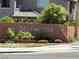 Stonegate community sign with lush landscaping and classic brick facade at 4132 Ancient Well Ct, Las Vegas, NV 89135