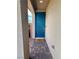 Inviting front door entrance framed by stone pavers and textured walls at 4132 Ancient Well Ct, Las Vegas, NV 89135