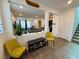 Open-concept living space with modern flooring, ample seating, and stylish decor at 4132 Ancient Well Ct, Las Vegas, NV 89135