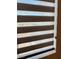 Elegant window treatment offering light control, privacy, and a sophisticated touch to the room's decor at 4132 Ancient Well Ct, Las Vegas, NV 89135