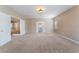 Large bedroom with neutral carpet and hallway access at 4133 Perfect Lure St, Las Vegas, NV 89129