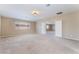 Spacious bedroom with double door entrance and neutral carpet at 4133 Perfect Lure St, Las Vegas, NV 89129