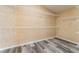 Walk-in closet with wood-look floors and shelving units at 4133 Perfect Lure St, Las Vegas, NV 89129