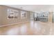 Spacious living room with tile floors and ample natural light showcases the open kitchen at 4133 Perfect Lure St, Las Vegas, NV 89129