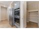 Kitchen pantry features stainless steel appliances and plentiful shelving at 4133 Perfect Lure St, Las Vegas, NV 89129