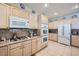 Bright kitchen with updated appliances, granite countertops, and abundant cabinetry for storage at 4187 Pacifico Ln, Las Vegas, NV 89135