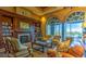 Inviting library with bookshelves, fireplace, and comfortable seating, perfect for reading at 4187 Pacifico Ln, Las Vegas, NV 89135