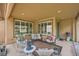 Covered patio area with furniture and decorations at 4187 Pacifico Ln, Las Vegas, NV 89135