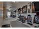 Well-equipped basement gym with workout equipment, mirrored wall, and ample space at 4594 Blue Mesa Way, Las Vegas, NV 89129