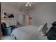 Bright bedroom with a chair and walk in closet at 4594 Blue Mesa Way, Las Vegas, NV 89129