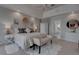 Relaxing main bedroom with neutral tones, stylish decor, and ample natural light at 4594 Blue Mesa Way, Las Vegas, NV 89129
