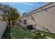 Private backyard putting green offers a unique outdoor recreation space at 4594 Blue Mesa Way, Las Vegas, NV 89129