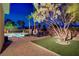 Lush backyard oasis with a relaxing lounge area and sparkling pool at 4624 Leon De Oro Dr, Las Vegas, NV 89129