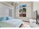 Comfortable bedroom with ample natural light and a built-in Murphy bed at 4624 Leon De Oro Dr, Las Vegas, NV 89129