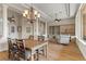 Bright living room with columns, coffered ceilings, ample seating and natural light at 4624 Leon De Oro Dr, Las Vegas, NV 89129