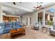 Bright living room with large windows seamlessly integrates with the well-appointed kitchen at 4624 Leon De Oro Dr, Las Vegas, NV 89129