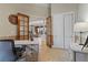 Office interior with desk, French doors, and seamless access to the home's open living spaces at 4624 Leon De Oro Dr, Las Vegas, NV 89129