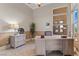 Cozy home office space with neutral tones, a desk, and natural light at 4624 Leon De Oro Dr, Las Vegas, NV 89129