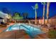 Inviting pool area surrounded by lush landscaping, creating a private oasis at 4624 Leon De Oro Dr, Las Vegas, NV 89129