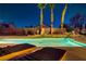 Inviting pool with waterfall feature and lounge chairs, perfect for relaxing evenings at 4624 Leon De Oro Dr, Las Vegas, NV 89129