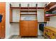 A well-organized walk-in closet boasts custom shelving and drawers for optimal storage and organization at 4624 Leon De Oro Dr, Las Vegas, NV 89129