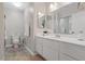 Bathroom with tiled floor, white vanity, and toilet at 4865 S Torrey Pines Dr # 206, Las Vegas, NV 89103