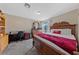 Bedroom featuring a comfortable bed, desk, and dresser at 4865 S Torrey Pines Dr # 206, Las Vegas, NV 89103