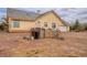 Exterior elevation highlighting the property's spacious lot, desert landscaping, and garage at 5081 Riata Pl, Pahrump, NV 89060