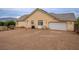 Spacious lot with garage and desert landscaping offers plenty of potential at 5081 Riata Pl, Pahrump, NV 89060