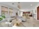 Open concept living area featuring modern furniture, decorative lighting, and seamless flow to other areas at 513 Monarch Ridge Ct, North Las Vegas, NV 89084