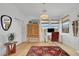 Home office with natural light, wood floors and decorative rug at 513 Monarch Ridge Ct, North Las Vegas, NV 89084