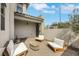 Cozy outdoor patio featuring comfortable seating and stylish decor in a modern home at 513 Monarch Ridge Ct, North Las Vegas, NV 89084