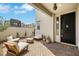 Cozy outdoor patio featuring comfortable seating and stylish decor in a modern home at 513 Monarch Ridge Ct, North Las Vegas, NV 89084