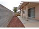 Covered back patio with ample space for outdoor seating and relaxation in a private setting at 5236 Ladyhawk Way, Las Vegas, NV 89118