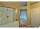 Bathroom with glass-enclosed shower and tiled walls, providing a clean and modern look at 5236 Ladyhawk Way, Las Vegas, NV 89118