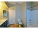 Bathroom featuring a vanity, toilet, and a shower-tub combo with a neutral color palette at 5236 Ladyhawk Way, Las Vegas, NV 89118