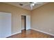 Bedroom featuring hardwood floors, neutral color palette, and ceiling fan at 5236 Ladyhawk Way, Las Vegas, NV 89118