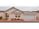 Charming single-story home with a two-car garage and well-maintained landscaping at 5236 Ladyhawk Way, Las Vegas, NV 89118