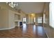 Open concept living room with hardwood floors, fireplace and lots of light at 5236 Ladyhawk Way, Las Vegas, NV 89118