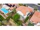 Backyard aerial view showing landscaping and a patio with a pergola at 5609 Red Bluff Dr, Las Vegas, NV 89130