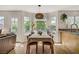 Dining area with natural light and views to the landscaped backyard at 5609 Red Bluff Dr, Las Vegas, NV 89130