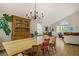 Open concept dining and living area with wood floors and ample natural light at 5609 Red Bluff Dr, Las Vegas, NV 89130