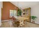 Dining room featuring wood floors, bright light, and traditional wood hutch at 5609 Red Bluff Dr, Las Vegas, NV 89130