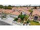 Charming single-Gathering home featuring a two-car garage, well-manicured landscaping, and a welcoming front entrance at 5609 Red Bluff Dr, Las Vegas, NV 89130
