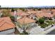 A residential home with a well maintained lawn, a two-car garage, and an inviting exterior at 5609 Red Bluff Dr, Las Vegas, NV 89130