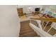 Carpeted staircase with a white banister, leading to the open living areas on the first floor at 5609 Red Bluff Dr, Las Vegas, NV 89130