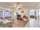 Inviting living room with hardwood floors, ceiling fans, and ample natural light at 5809 Robin Ln, Las Vegas, NV 89108