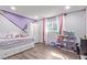 Bedroom featuring storage and a colorful design with modern light fixtures at 5813 Halifax Ave, Las Vegas, NV 89107